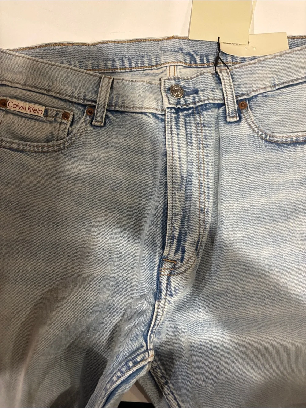 Calvin Klein Light Wash Denim Jeans with Tan Leather Patch - Picture 9 of 10